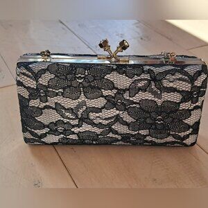 Chic Black and White Lace Clutch